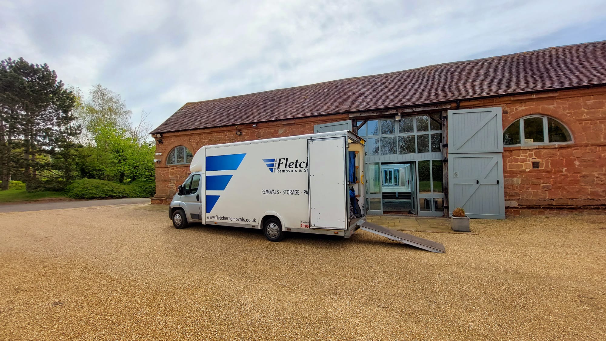 Removal truck at house